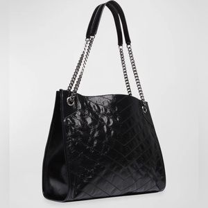 Saint Laurent- gently used 
Niki YSL Monogram Leather Shopping Tote Bag.